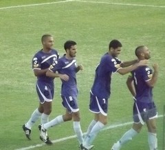 שחקני הכח חוגגים היום בוינטר. (צילום: אלון יהודיוף).