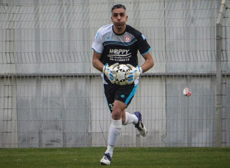 אבי עמוס (וויסאם מוואסי)