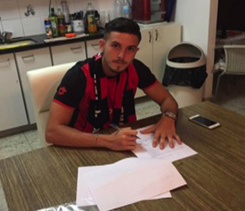 רוטמן במעמד החתימה