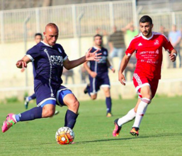 אשרף רבאח (באדום) (עודד חסין)