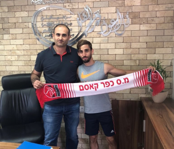 אדלשטיין במעמד החתימה