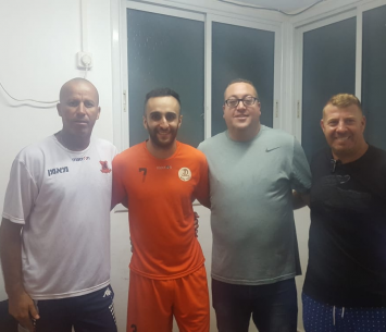 רחימי במעמד החתימה