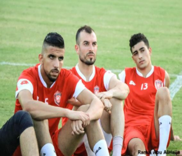  מואמן קאדרי (הראשון משמאל) (רמזי אבו אלהיג'א)