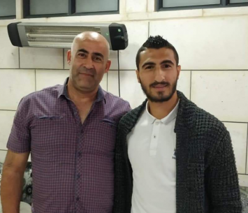 מחאמיד במעמד החתימה