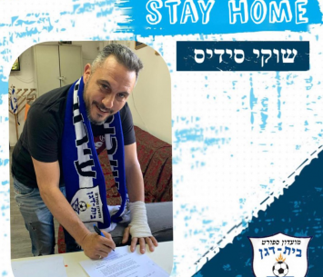 שוקי סדיס במעמד החתימה