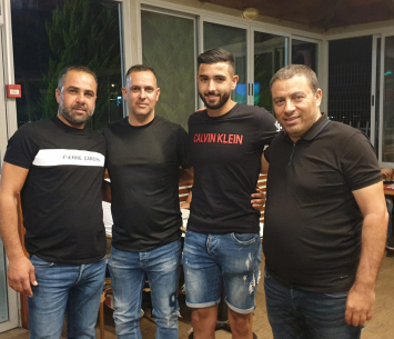 עודה במעמד החתימה