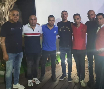 מחאגנה במעמד החתימה