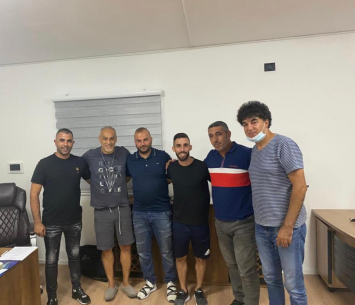 אדלשטיין במעמד החתימה