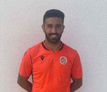 במדים הכתומים 