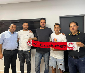 שרעבי במעמד החתימה