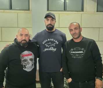 מחאגנה במעמד החתימה