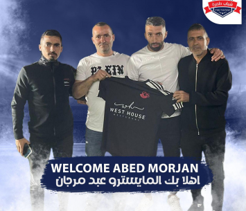 מורג'אן במעמד החתימה