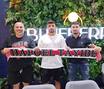 רחום במעמד החתימה 