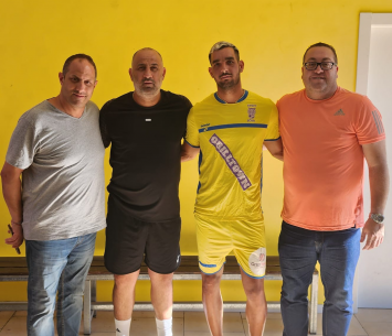 שריג במעמד החתימה 