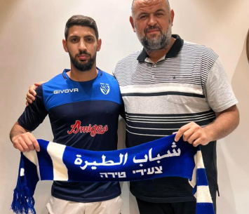 מואסי במעמד החתימה 