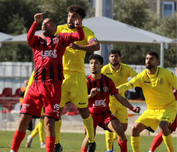 נפרדו בחלוקת נקודות. שחקני שתי הקבוצות (דאפר מחאמיד)