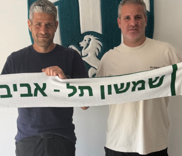 גוטמן במעמד החתימה