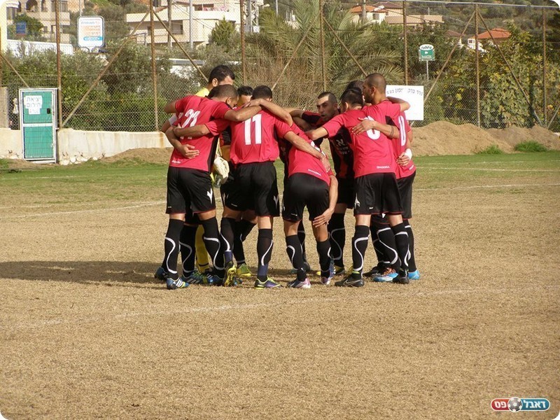 כרגע בפסגה. שחקני הפועל כפר כנא (אמיר שיבי)