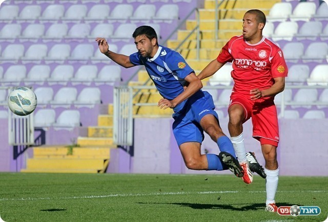 תומר לוי (באדום), בדרך הנוכנה למעלה (לירן דורף)