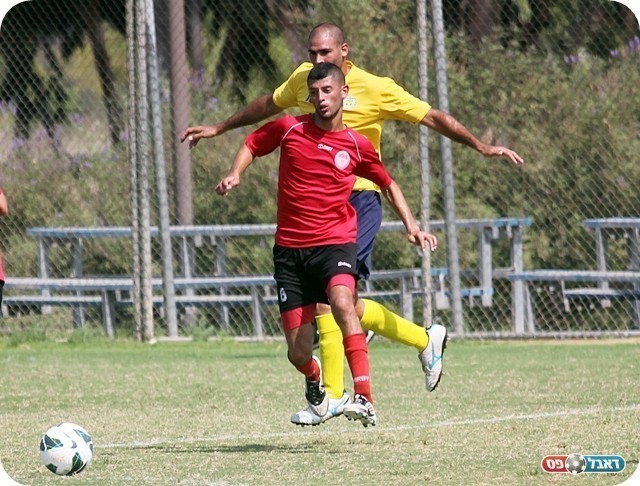 שמר על הניצחון. וולק (בצהוב) וסלמן (צילום: לירן דורף)