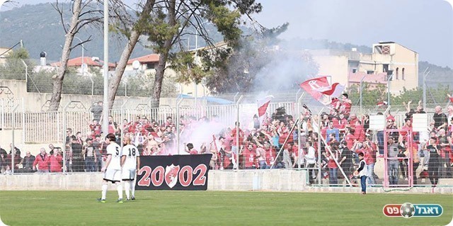 האבוקות שהודלקו ביציע של "רובי שפירא" (עדי מלול)