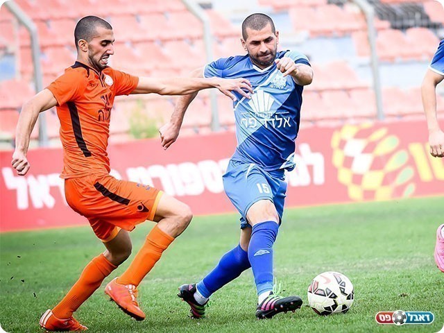 גיא עיני (בכתום) (רולנדי ברנשטיין)