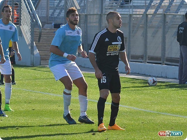 מוטי מלכה (בשחור) (ארנון לוי)